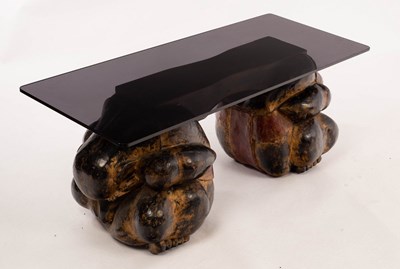 Lot 650 - A rectangular coffee table, the smoky glass...