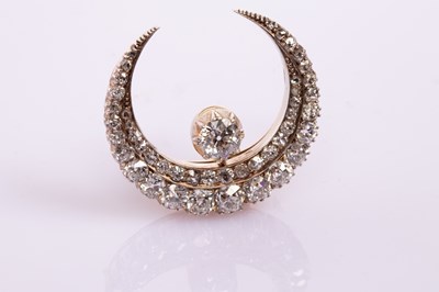 Lot 1 - A Victorian diamond crescent brooch, circa...
