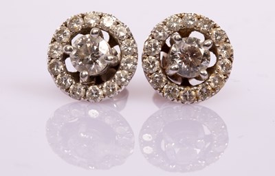 Lot 2 - A pair of diamond halo cluster ear studs, the...