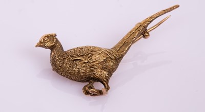 Lot 5 - A late 19th Century 9ct yellow gold pheasant...