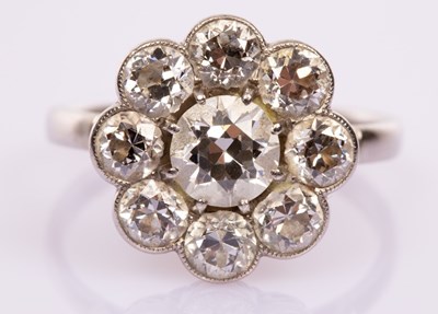 Lot 18 - A diamond cluster ring, the nine old brilliant...