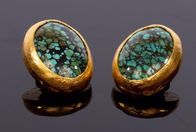 Lot 27 - A pair of turquoise and gold ear clips by...
