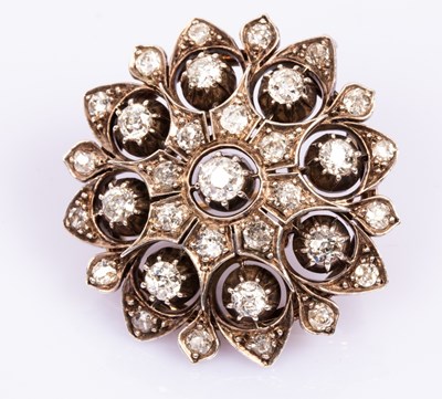 Lot 34 - A diamond brooch, circa 1890, the stylised...