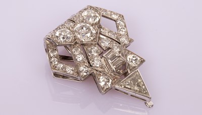 Lot 37 - An Art Deco diamond clip of stylised...