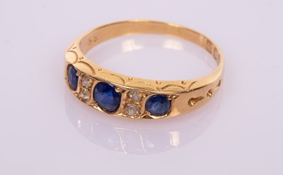 Lot 46 - A sapphire and diamond ring in 18ct gold, the...