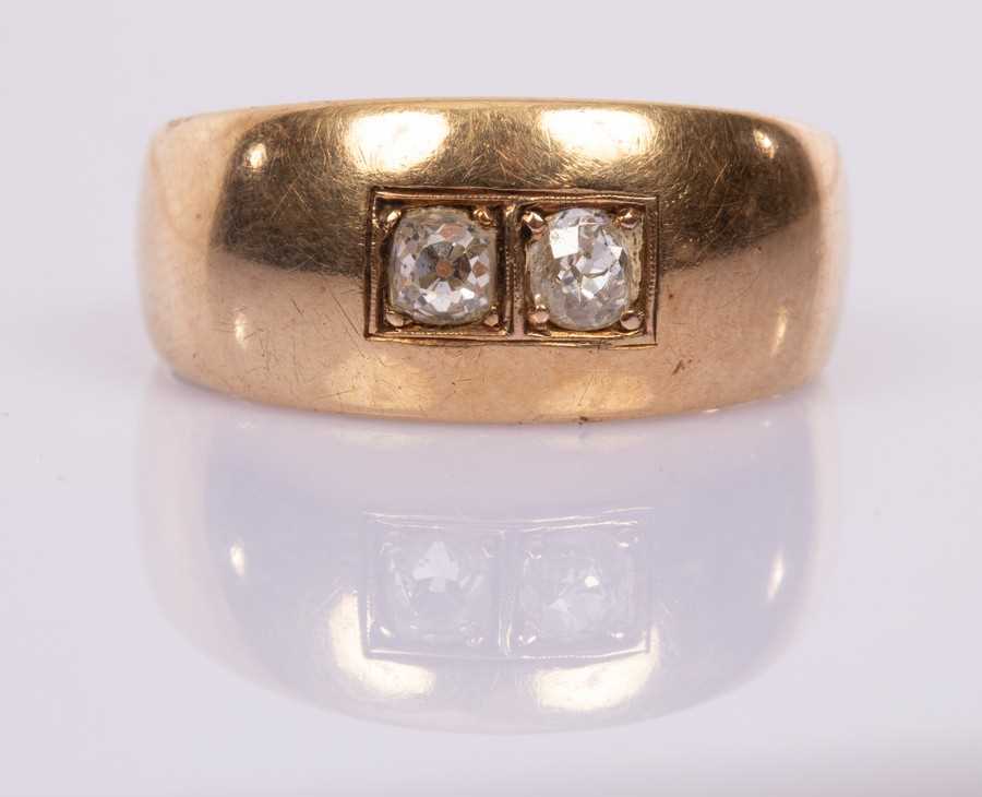 Lot 80 - A gentleman's diamond ring, the two diamonds...