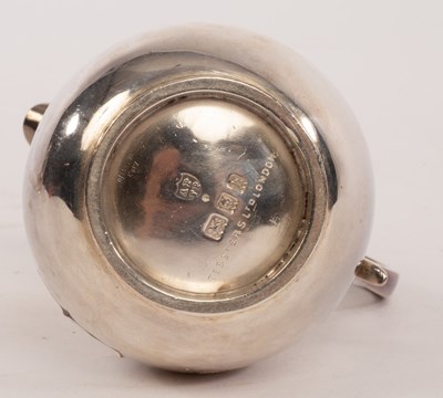 Lot 136 - A silver pear-shape cream jug, Arthur Martin...