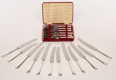 Lot 143 - A set of six silver handled dinner knives and...