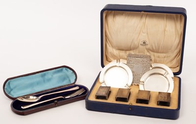 Lot 155 - A set of four silver ashtrays and four silver...