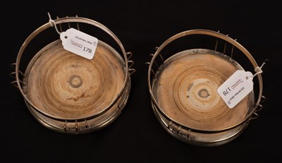 Lot 178 - A pair of Sheffield plate circular coasters...