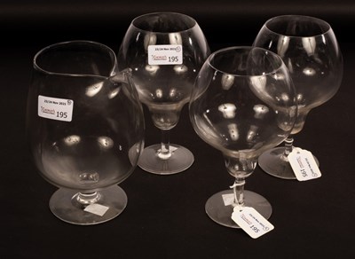 Lot 195 - A brandy balloon with squeezed spout and three...