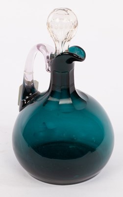 Lot 199 - A blue tinted glass claret jug and stopper,...