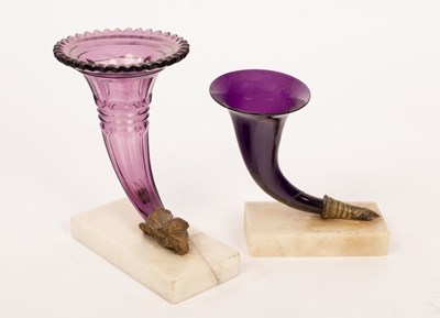 Lot 201 - Two early 19th Century amethyst glass...