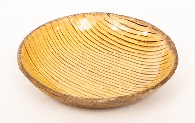 Lot 239 - A Staffordshire slipware dish with trailed...