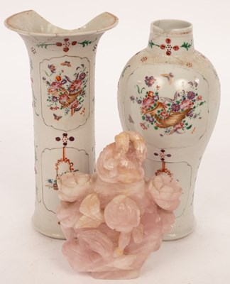 Lot 268 - A pink quartz vase decorated flowers in relief...