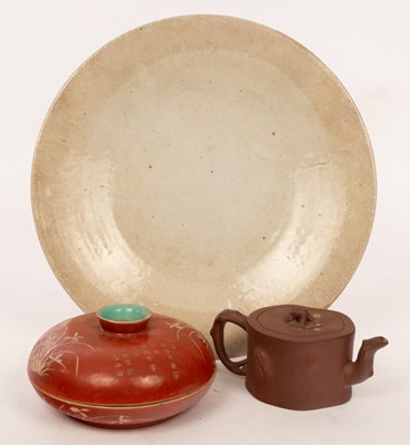 Lot 279 - A Chinese Qing dynasty red ground dish and...