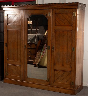 Lot 531 - An Aesthetic period pitch pine wardrobe with...