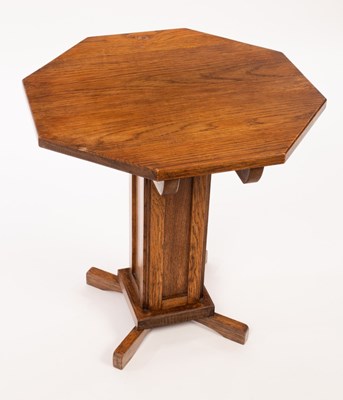 Lot 549 - An Arts & Crafts style octagonal oak...