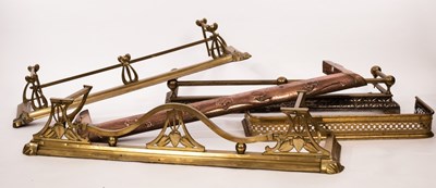 Lot 550 - An Art Nouveau brass fire curb with stylised...