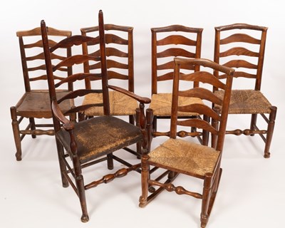 Lot 587 - A ladder back armchair and five rush seated...