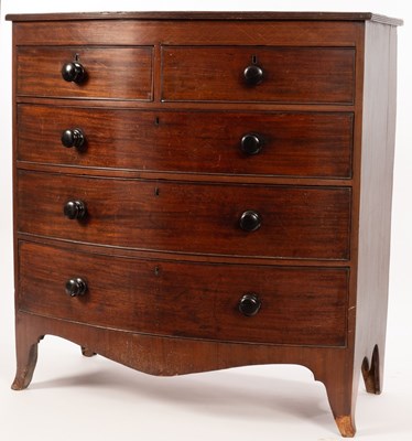 Lot 590 - An early 19th Century mahogany bowfront chest...