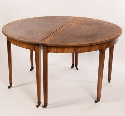 Lot 593 - Two D ends from a dining table, each on four...