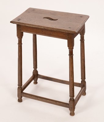 Lot 595 - A 19th Century coffin type oak stool, the...