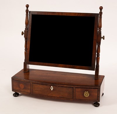 Lot 603 - A Georgian mahogany swing frame dressing...