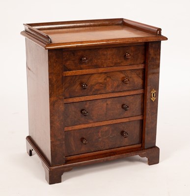 Lot 613 - A small Regency mahogany Wellington chest, the...