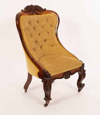 Lot 614 - An early Victorian rosewood nursing chair with...