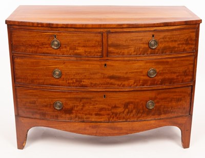 Lot 629 - A early 19th Century mahogany bowfront chest,...