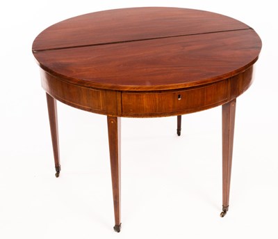 Lot 630 - A Georgian mahogany D-shaped table with...