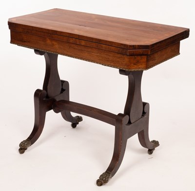 Lot 631 - A Regency rosewood card table the cross banded...