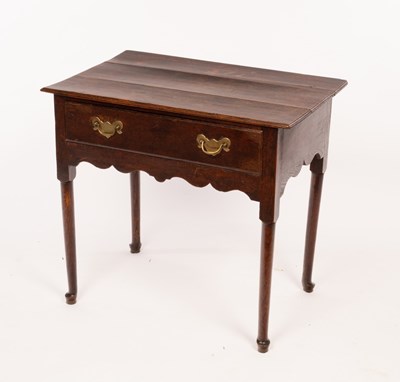 Lot 632 - A mid 18th Century oak side table with triple...