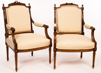 Lot 636 - A pair of 19th Century French walnut armchairs,...