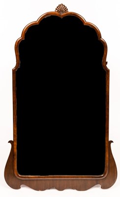 Lot 640 - A mahogany wall mirror with moulded frame and...