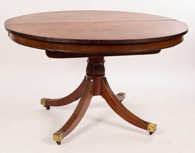 Lot 642 - A Regency mahogany extending dining table with...