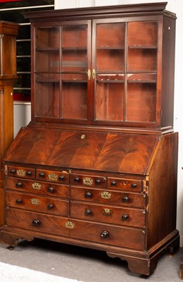 Lot 643 - A George III mahogany double bureau, the...