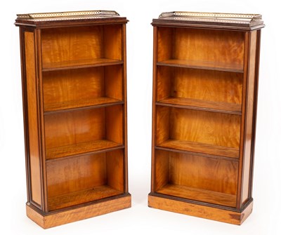 Lot 669 - A pair of Edwardian satinwood bookcases of...