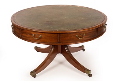 Lot 670 - A mahogany circular drum library table, the...