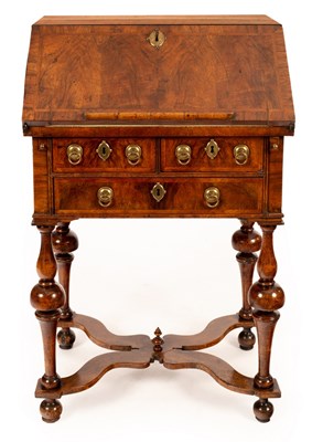 Lot 734 - A small Queen Anne walnut bureau, circa 1690,...