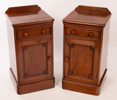 Lot 759 - A pair of mahogany bedside tables, each fitted...