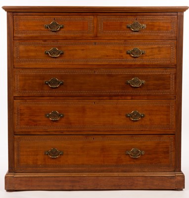 Lot 763 - An Edwardian walnut chest of two short over...