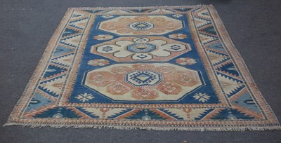 Lot 786 - A Kazak carpet of geometric design, 319cm x 206cm