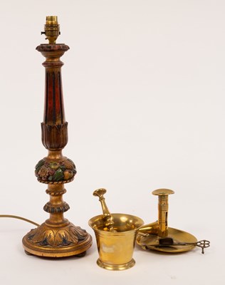 Lot 815 - A carved and painted table lamp, a brass...