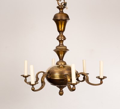 Lot 820 - An early 20th Century chandelier with six...