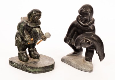 Lot 837 - Two carved slate figures of Eskimos, one with...