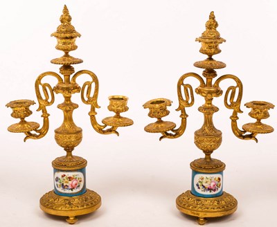 Lot 842 - A pair of French two branch three-light table...