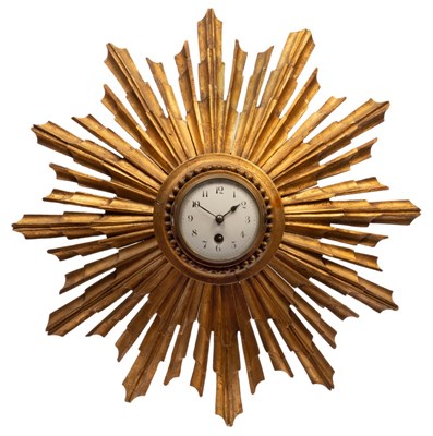 Lot 861 - A 19th Century carved and gilt pine sunburst...