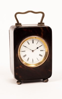 Lot 864 - An Edwardian tortoiseshell cased clock, the...